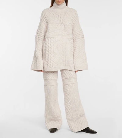 Shop Nanushka Raw Cable-knit Wool-blend Sweater In White