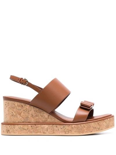 Shop Ferragamo Vara Bow 55mm Wedge Sandals In Braun