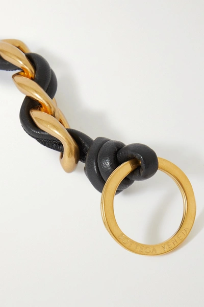 Shop Bottega Veneta Knotted Leather And Gold-tone Keyring In Black