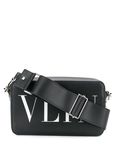Shop Valentino Logo Print Crossbody Bag In Black