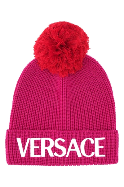 Shop Versace Logo Printed Pompom Detailed Beanie In Pink