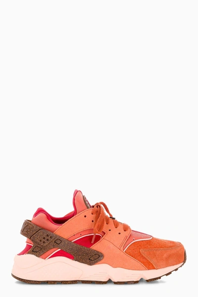 Shop Nike Air Huarache Sneakers In Orange