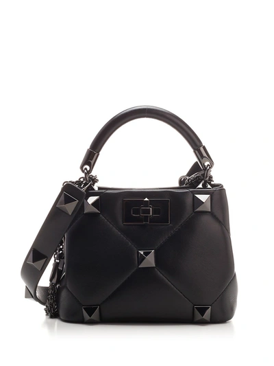 Shop Valentino Garavani Roman Stud Mini Tote Bag In Black