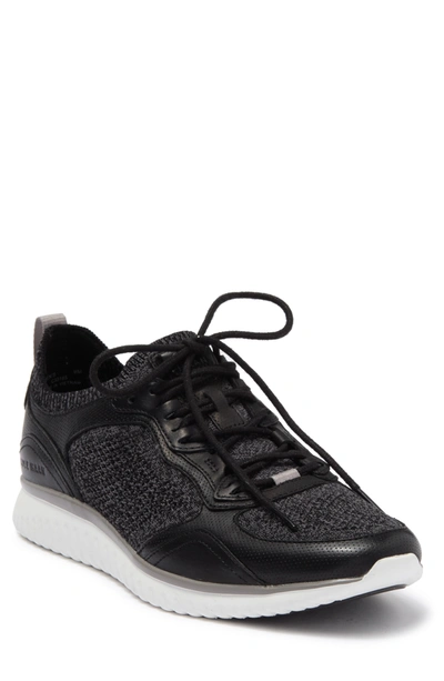 Shop Cole Haan Grandmotion Crafted Sneaker In Black/optic White