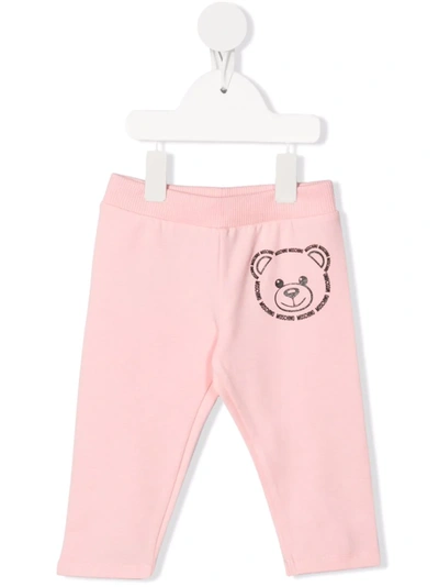Shop Moschino Teddy Bear Print Tracksuit Bottoms In 粉色