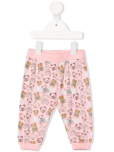 Shop Moschino Teddy Bear Print Tracksuit Bottoms In 粉色