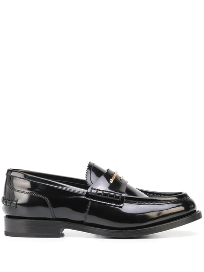 Shop Alexander Wang Embossed-logo Loafers In Schwarz