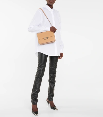 Shop Saint Laurent Fermoir Small Leather Shoulder Bag In 棕色