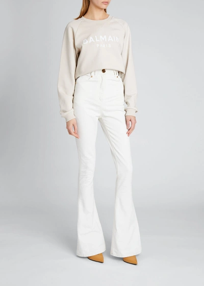 Shop Balmain High-waist Bootcut Jeans In White