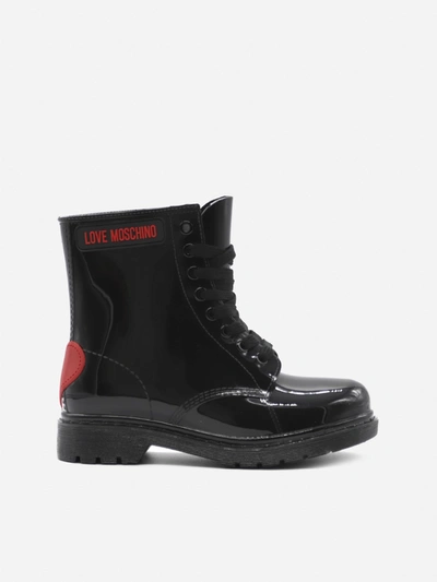 Shop Love Moschino Lace-up Boots In Glossy Finish With Logo Patch In Black