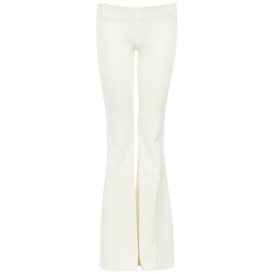 Shop Galvan White Flared Satin-jersey Trousers