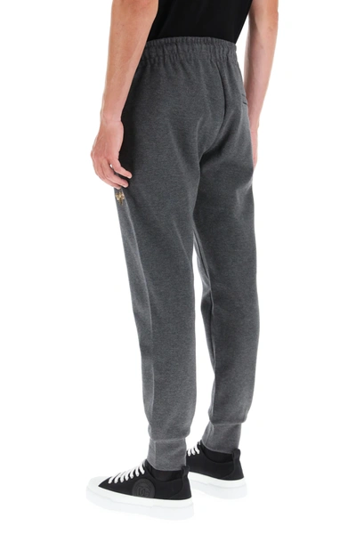 Shop Dolce & Gabbana Jogging Trousers With Bee And Crown Lurex Embroidery In Grey,gold