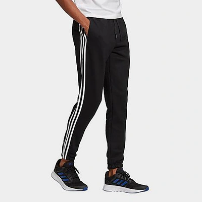Shop Adidas Originals Adidas Men's Essentials Fleece Tapered Elastic Cuff 3-stripes Pants In Black