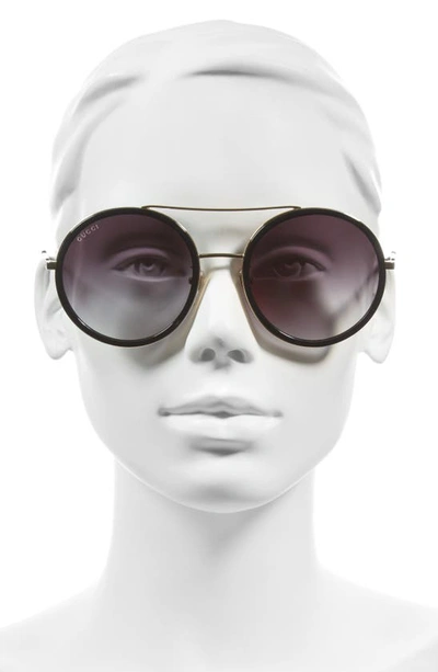 Shop Gucci 56mm Round Sunglasses In Gold