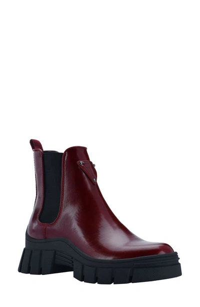 Shop Guess Hestia Chelsea Boot In Cherry Faux Leather
