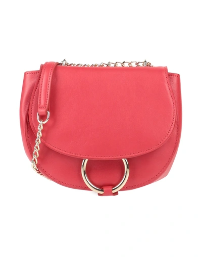 Atos Lombardini Handbags In Red | ModeSens