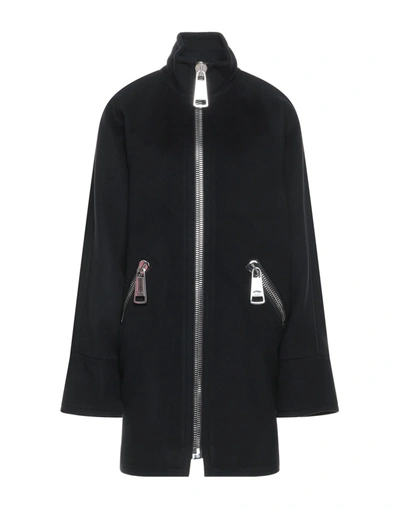 Shop Moschino Coats In Black
