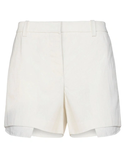 Shop Givenchy Shorts & Bermuda Shorts In White