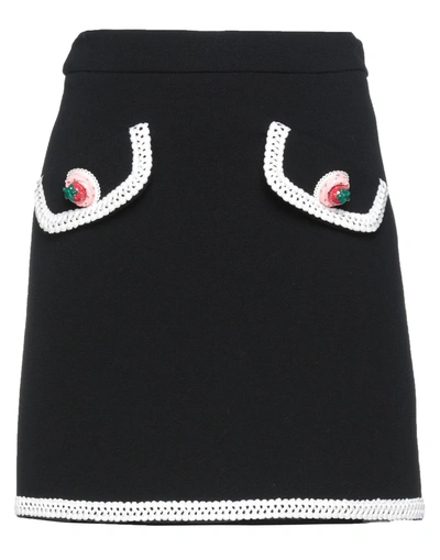 Moschino Midi Skirts In Black
