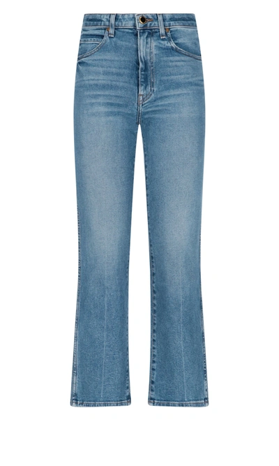 Shop Khaite Flared Cropped Jeans In Blue