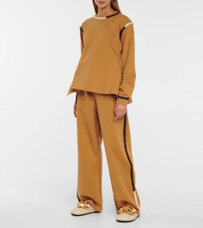 Shop Jw Anderson Embroidered Cotton Jersey Sweatshirt In Brown