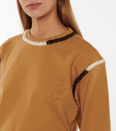 Shop Jw Anderson Embroidered Cotton Jersey Sweatshirt In Brown
