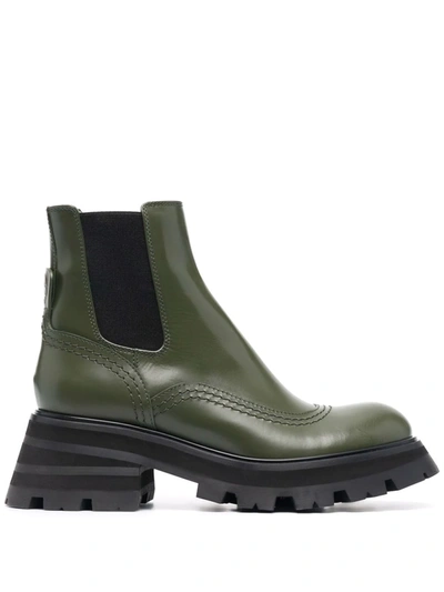 Shop Alexander Mcqueen Wander Ridged-sole Leather Boots In Grün