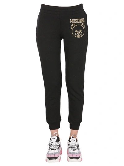 Shop Moschino Jogging Pants With Logo In Nero