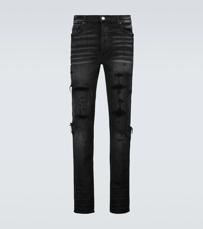 Shop Amiri Trasher Plus Jeans In Black