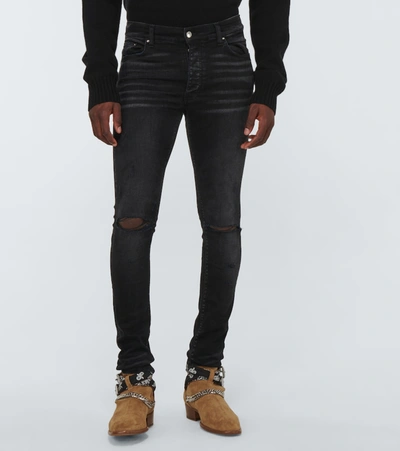 Shop Amiri Slash Jeans In Black