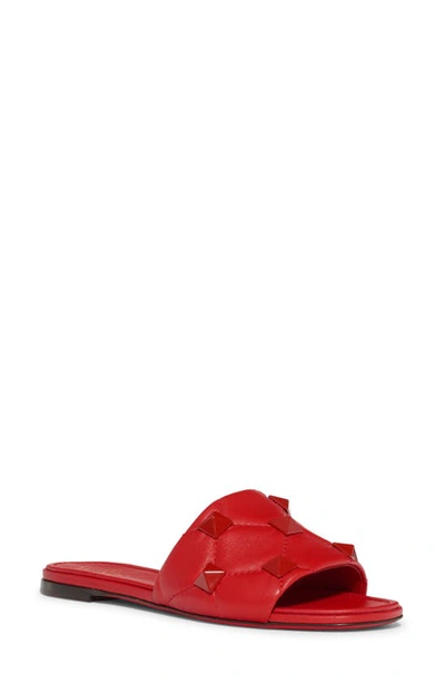Shop Valentino Roman Stud Matelassé Slide Sandal In Rouge