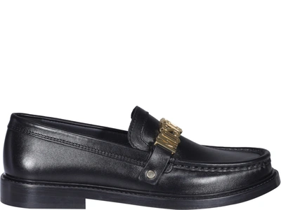 Shop Moschino Logo Loafers In Black