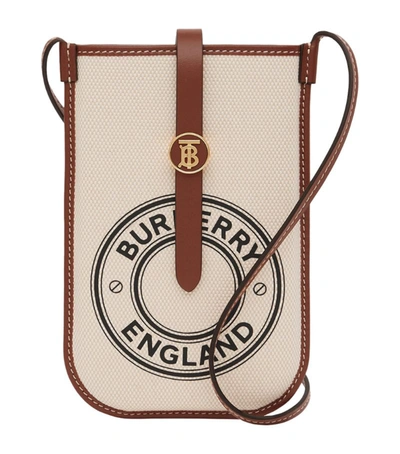 Shop Burberry Canvas Anne Cross-body Phone Case In Brown
