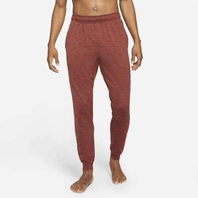 Shop Nike Men's  Yoga Dri-fit Pants In Red