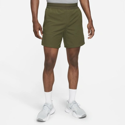Shop Nike Pro Men's Shorts In Rough Green,black