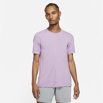 Shop Nike Yoga Dri-fit Men's Short-sleeve Top In Violet Shock,iced Lilac,black