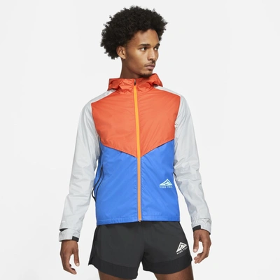 Shop Nike Windrunner Men's Trail Running Jacket In Orange,signal Blue,grey Fog,green Glow