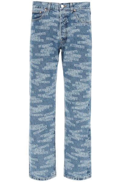 Shop Vetements Monogram Print Jeans In Blue