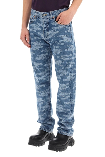 Shop Vetements Monogram Print Jeans In Blue