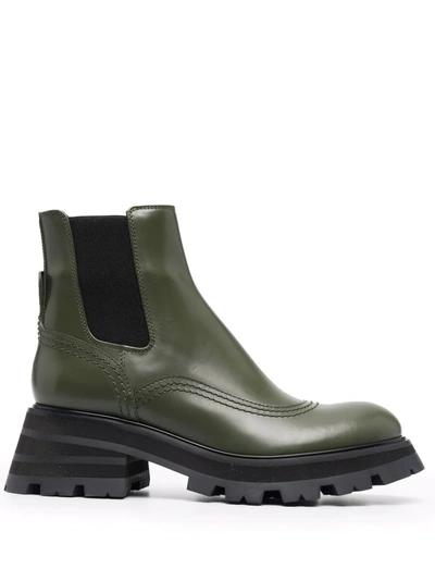 Shop Alexander Mcqueen Ridged-sole Leather Boots In Grün