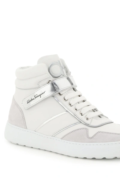 Shop Ferragamo High Sneakers Gancini In White