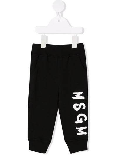 Shop Msgm Logo-print Cotton Trousers In 黑色