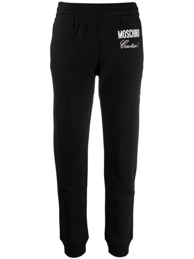 Shop Moschino Embellished-logo Track Pants In Schwarz