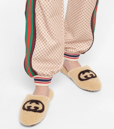 Shop Gucci Shearling Slippers In Beige