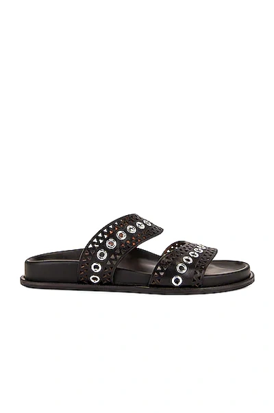 Shop Alaïa Perforated Eyelet Slides In Noir