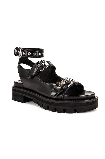 Alaïa Buckle Lug-sole Sporty Sandals In Noir