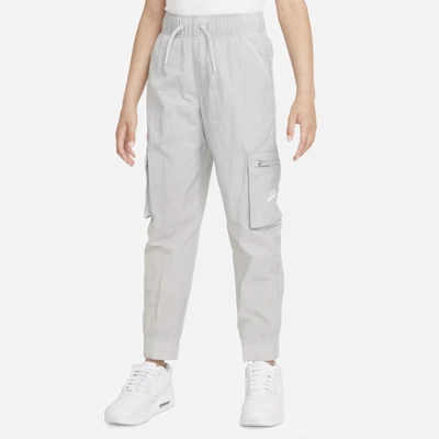 Shop Nike Sportswear Big Kids' (girls') Woven Cargo Pants In Grey