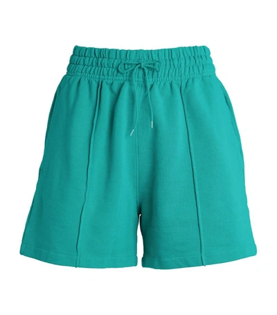 Shop Agolde 90s Pintuck Shorts In Green