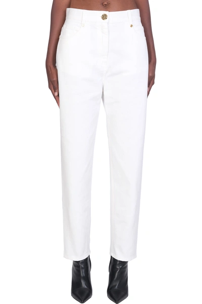 Shop Balmain Jeans In White Denim