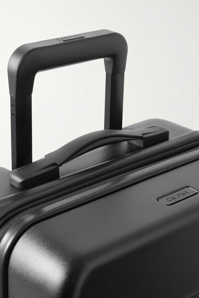Shop Calpak Hue Carry-on Hardshell Suitcase In Black